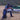 Shooter at the range with an AR-15 platform rifle and a Sling Steady rear squeeze bag